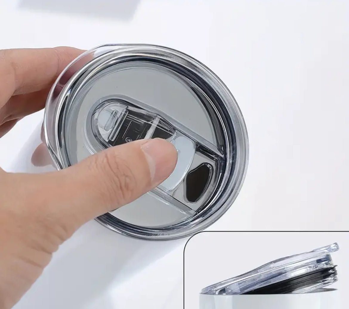 Close-up of a hand holding a clear lid for a Cardi B stainless steel tumbler by Simply Radiant Creations