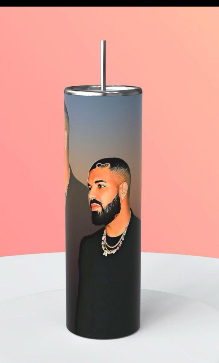 Simply Radiant Creations Drake skinny tumbler featuring an artistic portrait of Drake with a metal lid and straw